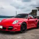 Red Mini Coupe Parked Port