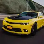 Yellow Sport Car With Black Autotuning Road